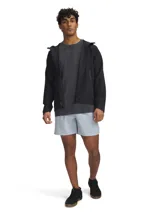 Short deportivo Under Armour Vanish Elite, color gris claro, con aberturas laterales en el dobladillo, perforaciones láser para ventilación y logo de la marca en el muslo derecho.