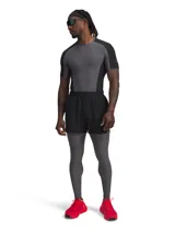 Short Under Armour Halo Train de color negro, diseñado para entrenamiento con tejido elástico ligero, cintura elástica con cordón y bolsillos laterales.