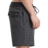 Short de baño Volcom color gris oscuro con estampado geométrico de estrellas pequeñas en tono violeta. Presenta cintura elástica con cordón de ajuste frontal y corte corto.
