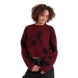 Buzo de punto color bordó con estampado gráfico en negro, cuello redondo, mangas largas y corte holgado tipo crop.