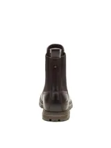 Bota tipo Chelsea de cuero marrón con paneles elásticos laterales, logo de la marca grabado en el talón y suela de goma dentada.