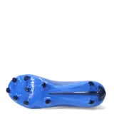 Championes de fútbol Puma Ultra Match para terreno firme, en color azul con detalles en blanco y naranja. Presentan un diseño de corte medio con tejido técnico ligero y suela con tapones para tracción en césped natural.