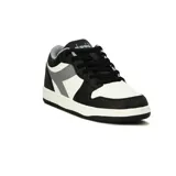 Championes urbanos Diadora modelo Milano, de caña baja, color negro con detalles en blanco y gris.