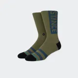 Par de medias Stance OG color verde militar con puntera y talón negros, rayas horizontales azules y celestes, y logo de la marca en el tobillo.
