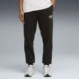 Pantalón de jogging Puma en color negro, con ajuste elástico en los tobillos y logo de la marca estampado en la pierna izquierda.
