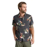 Camisa de manga corta de algodón orgánico y tencel, color negro con estampado floreado tropical, cuello camisero, cierre frontal de botones y un bolsillo ojal en el pecho.