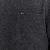 Buzo Rip Curl Grid Crew color negro, de manga larga, con cuello redondo y bolsillo tipo parche en el pecho con etiqueta de la marca.