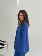 Conjunto de pantalón y blusa color beige, de punto morley.