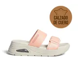 Sandalia casual Usaflex modelo Gianna, confeccionada en cuero color rosado con tiras ajustables con velcro y plataforma gris con cápsula de aire en el talón.