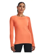 Remera de manga larga Under Armour de alto rendimiento, confeccionada en tejido HeatGear de secado rápido y tecnología absorbente de sudor. Presenta un diseño ajustado con cuello redondo y textura microperforada, ideal para entrenamiento.
