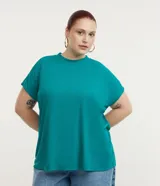 Blusa tipo muscle tee de corte holgado, confeccionada en tejido rib acanalado, con escote redondo y diseño sin mangas.