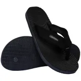 Ojotas Havaianas Surfer Coast, color negro, con tiras de tela texturizada y suela con diseño ondulado.