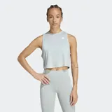 Musculosa de entrenamiento Adidas con diseño boxy y corte holgado. Presenta cuello redondo, sisas amplias para mayor libertad de movimiento y logo de la marca estampado en el pecho. Confeccionada con tecnología CLIMACOOL para gestión de la humedad.