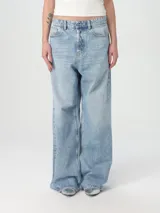 Jeans de denim de corte relajado, tiro bajo y piernas anchas extralargas, en lavado azul claro con cierre de botones.