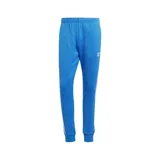 Pantalón de jogging azul con cintura elástica y cordón ajustable, bolsillos laterales con cierre y logo de Adidas bordado en blanco.
