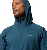 Campera cortaviento Columbia Trailborne Jacket Omni-Shield, color azul, con capucha incorporada, cierre frontal y bolsillos laterales con cremallera. Incorpora tecnología repelente a la humedad y manchas.