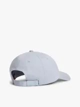 Gorra de béisbol Tommy Jeans de color celeste, con visera curva, ojales de ventilación y parche bordado con el logo de la marca en el frente.