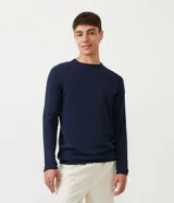 Buzo de punto manga larga con cuello redondo, confeccionado en algodón. Presenta un diseño clásico y básico con puños y ruedo acanalados.