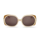 Lentes de sol Mr Boho modelo Zicatela, con montura geométrica oversize en tonos beige y marrón ámbar, y cristales oscuros.