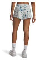 Shorts deportivos Under Armour de mujer, modelo Vanish Woven Print, con estampado tie-dye en tonos blanco y azul. Presentan cintura elástica visible con branding, bolsillos laterales abiertos, aberturas laterales en el bajo y braguita interior integrada para mayor cobertura.