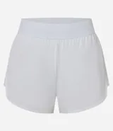 Short deportivo modelo runner de corte holgado, con cintura elástica ancha y bajo redondeado. Confeccionado en tejido técnico de secado rápido, ideal para actividades físicas.