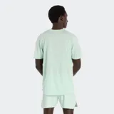 Remera deportiva de manga corta New Balance, color verde menta, con tecnología de secado rápido NB ICEx y logo de la marca estampado en el pecho.
