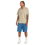 Bermuda vaquera Volcom modelo ABG Billow Denim de 22 pulgadas, en color azul clásico, con corte holgado, tiro bajo y pernera larga.