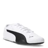 Championes Puma modelo Catch, de diseño urbano y perfil bajo. Presentan una base de color blanco con la icónica franja lateral de la marca en color negro y suela de goma negra. Incluyen cierre por cordones y logo de la marca en la puntera y lengüeta.