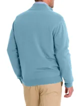 Sweater celeste de cuello alto con medio cierre, confeccionado en hilado italiano que combina lana extrafina y cashmere. Diseño clásico y elegante de calce regular.