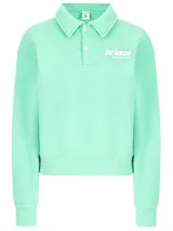 Buzo polo deportivo Prince bordado en menta con logo en blanco. Fabricado con 100% algodón, preencogido y de calce holgado con largo corto.