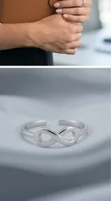 Anillo de plata 925 con diseño de símbolo de infinito, con estructura abierta en la parte inferior.