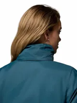 Campera impermeable Columbia Switchback IV color azul oscuro, con capucha ajustable, cierre frontal y bolsillos laterales con cremallera.