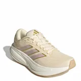 Championes de running Adidas Response 2, color beige con detalles en lila y dorado.