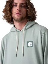 Buzo con capucha y bolsillo canguro de la marca Cat, color verde menta, con cordón de ajuste crudo, puños y dobladillo de punto acanalado, y pequeño logo estampado en el pecho.