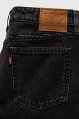 Jeans de corte recto y tiro bajo en color negro con efecto lavado, confeccionados en denim con diseño clásico de cinco bolsillos y cierre frontal con botón y cremallera.