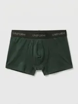 Boxer verde oscuro con cintura elástica negra con la inscripción "Uniform" repetida.
