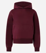 Buzo de algodón con felpa, color bordó, con capucha estructurada, bolsillo canguro delantero y puños canelados.