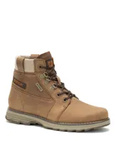 Bota de caña media Caterpillar modelo Charli, confeccionada en cuero impermeable con detalles en tela en el cuello. Presenta cordones frontales, ojales metálicos y suela de goma con entresuela de EVA.