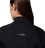 Buzo polar Columbia de media cremallera color negro, con cuello alto, mangas largas con orificios para los pulgares y logo de la marca estampado en el pecho. Incorpora tecnologías Omni-Wick y Omni-Shade.