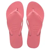 Sandalias de goma Havaianas Slim de color rosado, con tiras finas y suela con textura de grano de arroz.