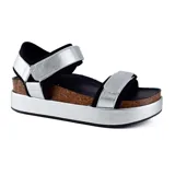 Sandalias negras con plataforma, tiras anchas con velcro y plantilla de corcho.