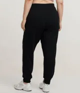 Pantalón deportivo tipo jogger de Ashua, con cintura elástica ajustable, bolsillos laterales y puños ajustados en los tobillos.