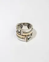 Anillo de plata 925 con doble de oro y circonitas blancas.