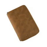 Portapasaporte de cuero genuino con acabado texturizado y cierre perimetral. Cuenta con tecnología de protección anticlonación, capacidad para dos pasaportes, seis tarjetas, efectivo y documentos de viaje.