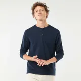 Remera de manga larga con cuello panadero y cierre frontal de tres botones, confeccionada en tejido de algodón de color azul marino.