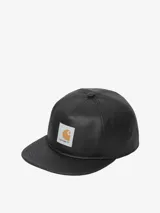 Gorra de béisbol Carhartt modelo Dean, color negro con visera plana y parche frontal con el logo de la marca.
