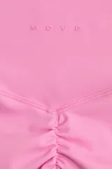 Bikers deportivas de tiro alto en color rosado, confeccionadas con tejido funcional SculptMove que realza la silueta y ofrece sujeción. Cuentan con cintura ancha y tecnología DryMove para absorber el sudor.