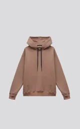 Hoodie oversize de frisa premium color cañamo (marrón claro/beige), con capucha ajustable, bolsillo canguro y puños elastizados con orificios para los pulgares.