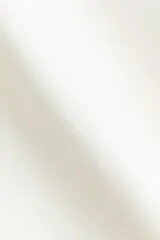 Vestido corto sin mangas de sarga de algodón en color blanco, con leve corte evasé, escote redondo y tiras finas para atar en la nuca.