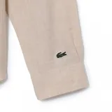 Camisa de franela color beige con estampado del logo de Lacoste en negro.